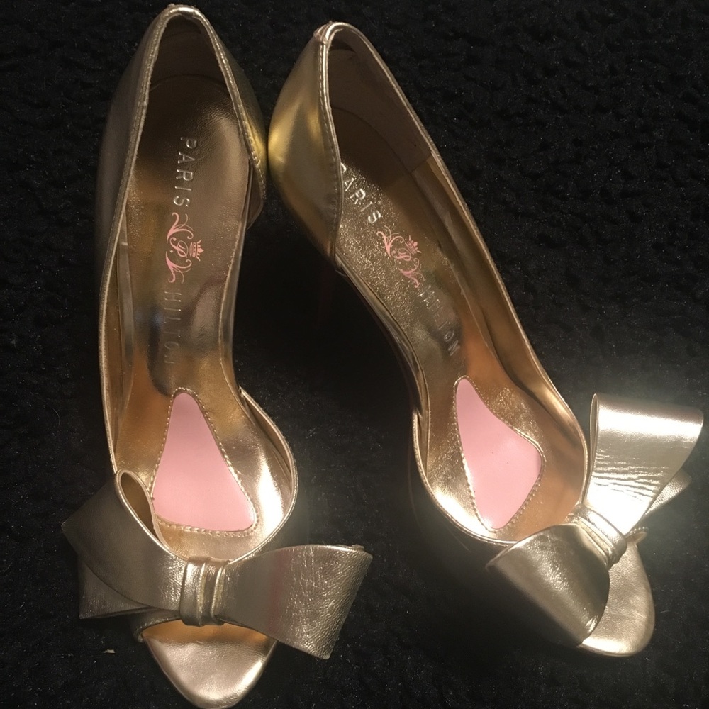 Paris Hilton gold heels with bows
